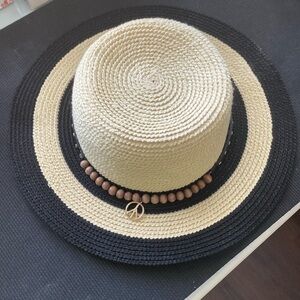 Hat new with tag, D 7”